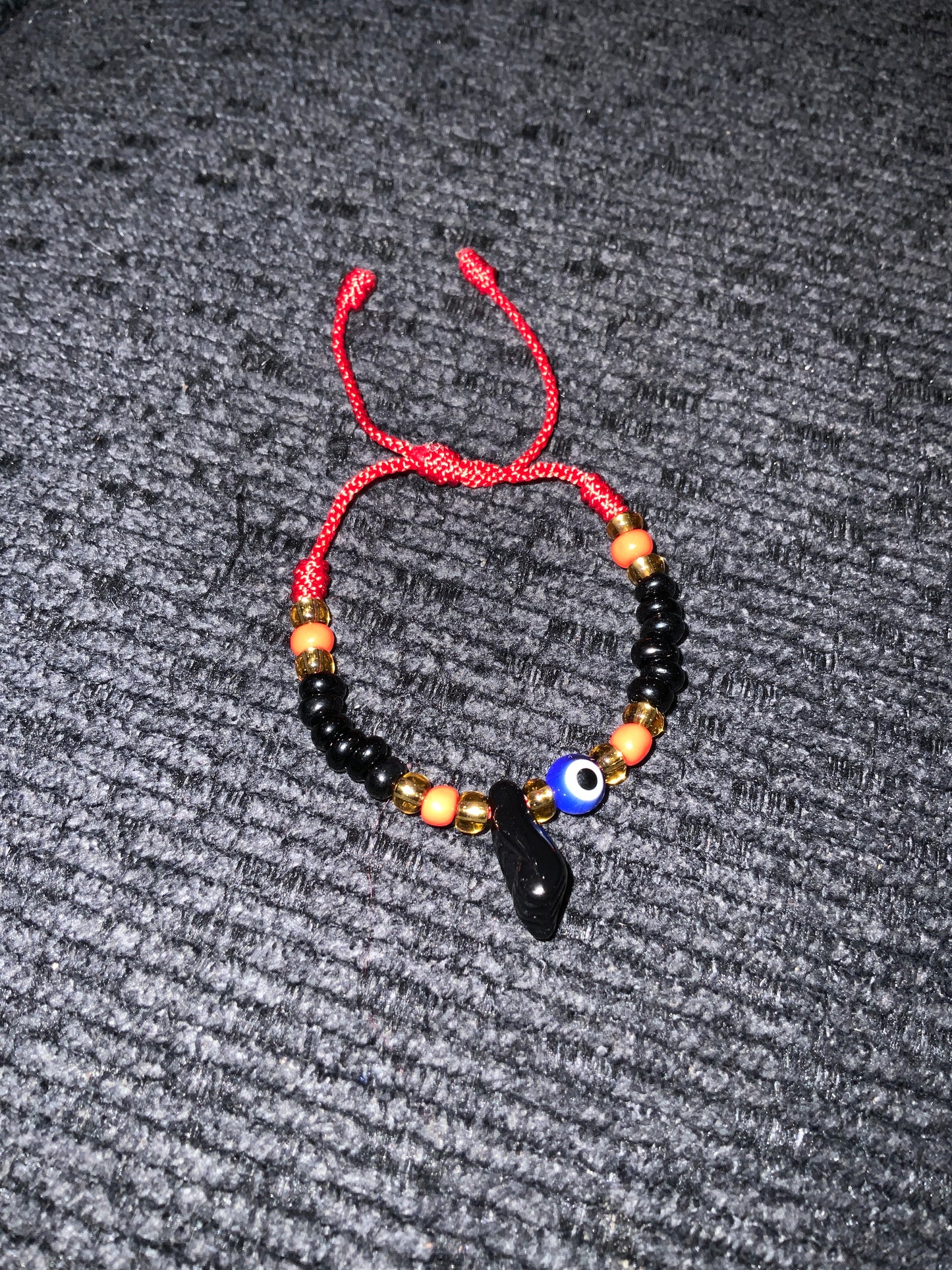 Baby thread bracelet with turkish eye & black hand