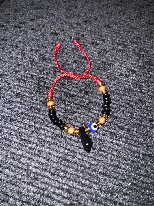 Baby thread bracelet with turkish eye & black hand